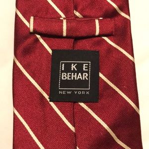 Red tie with gold stripes